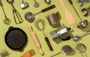 top-view-supplies-composition-with-green-background_23-2149491458
